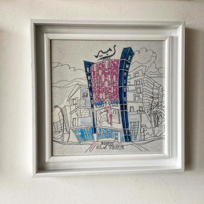 Example of a Retrospaces sketch print, framed in white